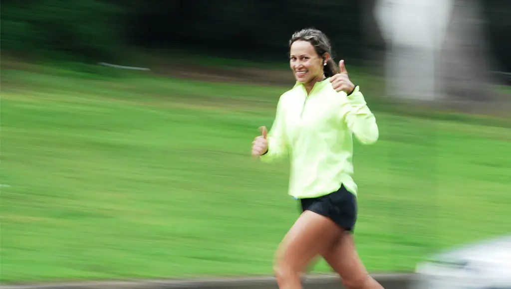 Running Woman in Green Top